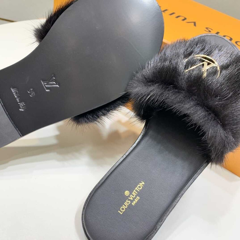 l**is V*t*n black furry slippers