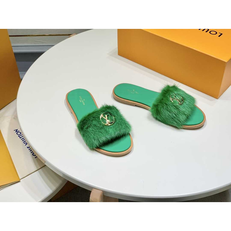 l**is V*t*n green furry slippers