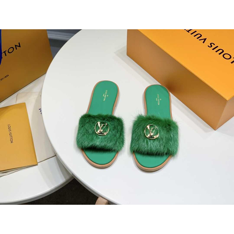 l**is V*t*n green furry slippers