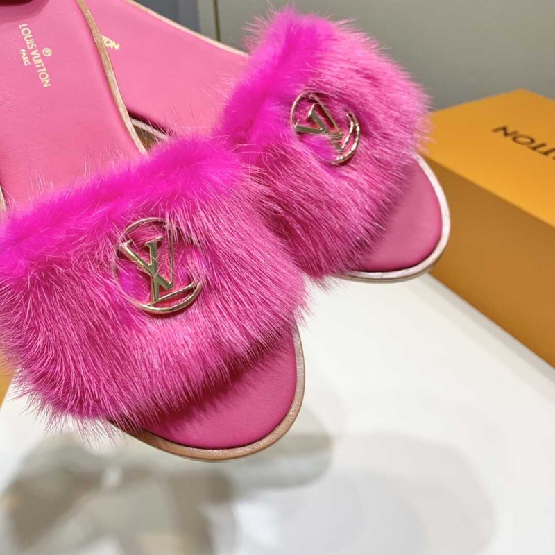 l**is V*t*n pink furry slippers