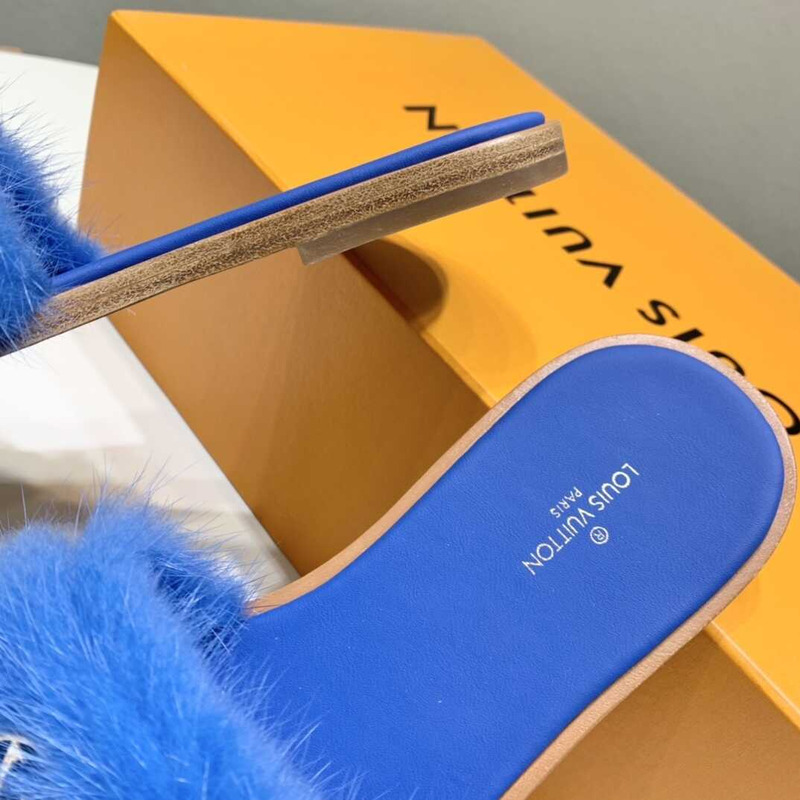 l**is V*t*n blue furry slippers