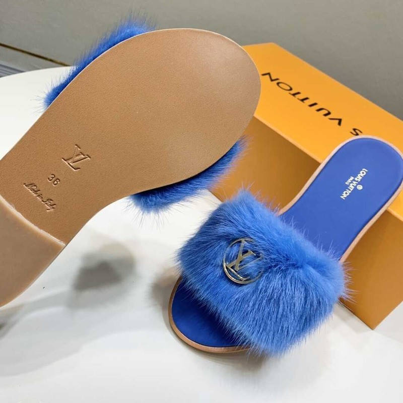 l**is V*t*n blue furry slippers