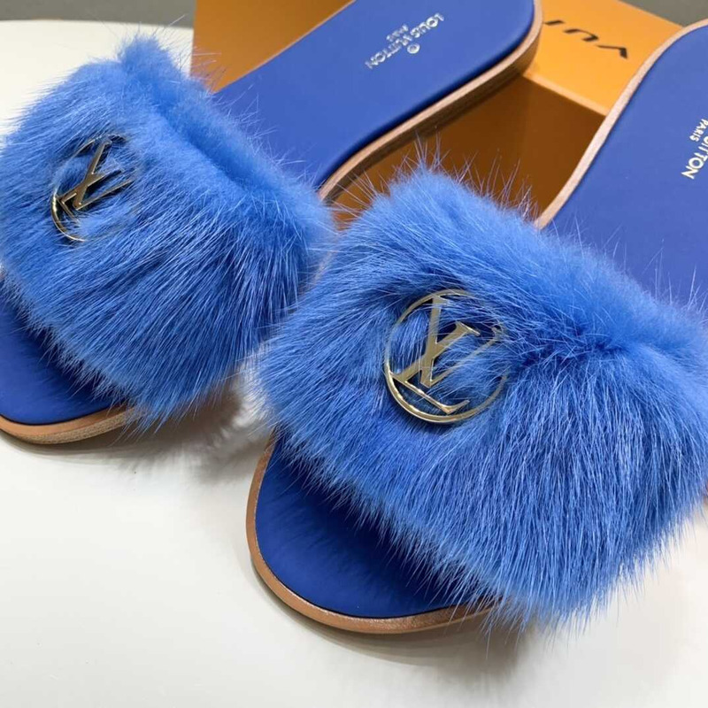 l**is V*t*n blue furry slippers