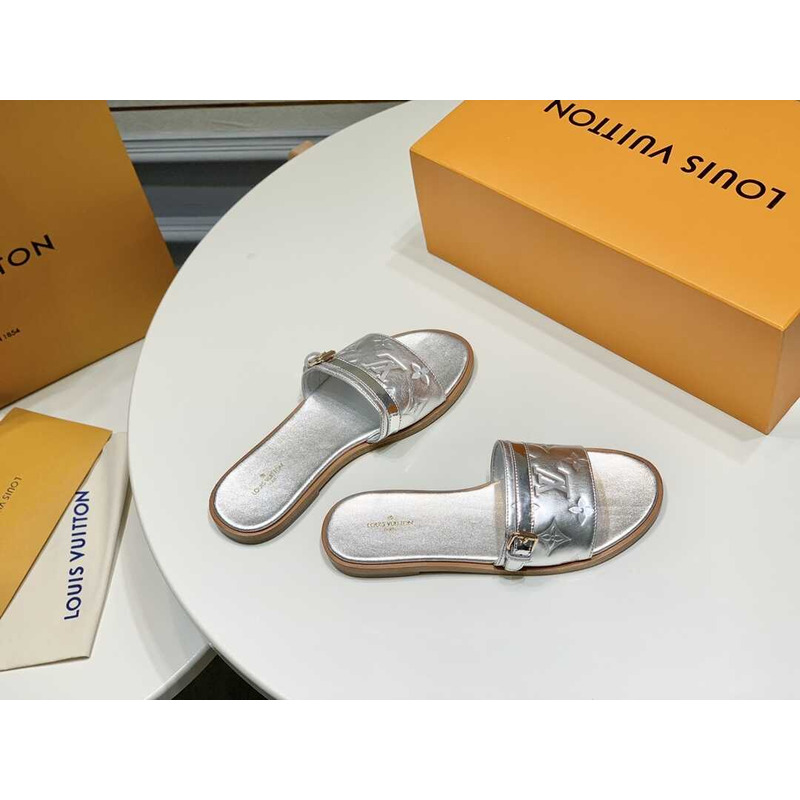 l**is V*t*n lock it flat sandals silver