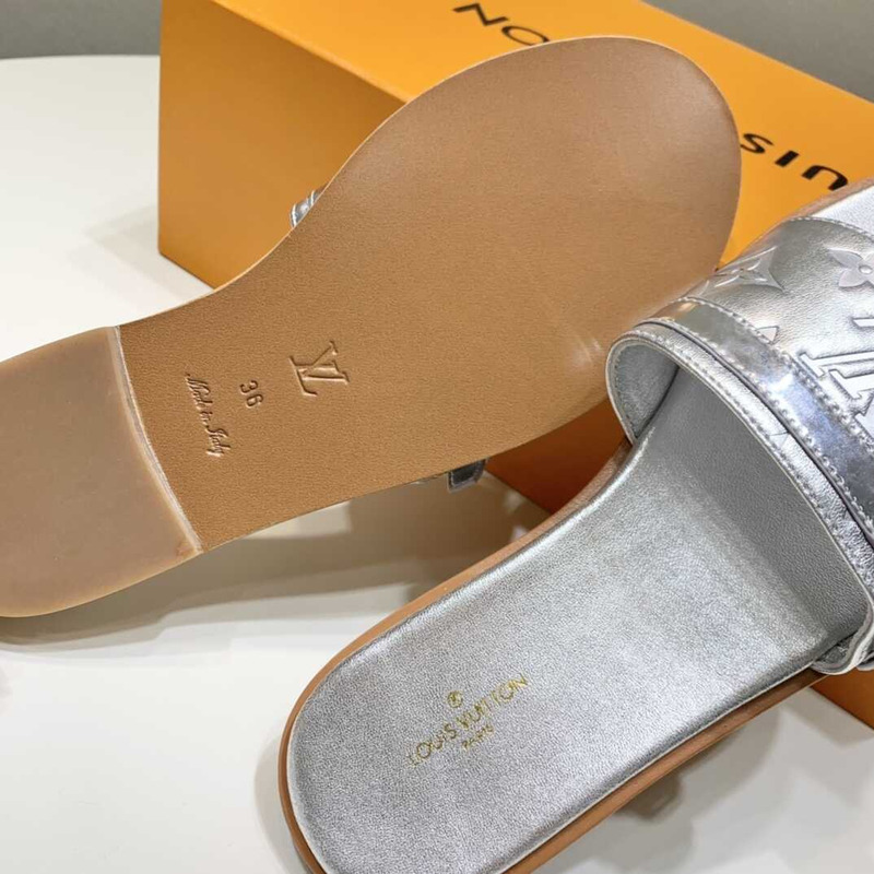 l**is V*t*n lock it flat sandals silver