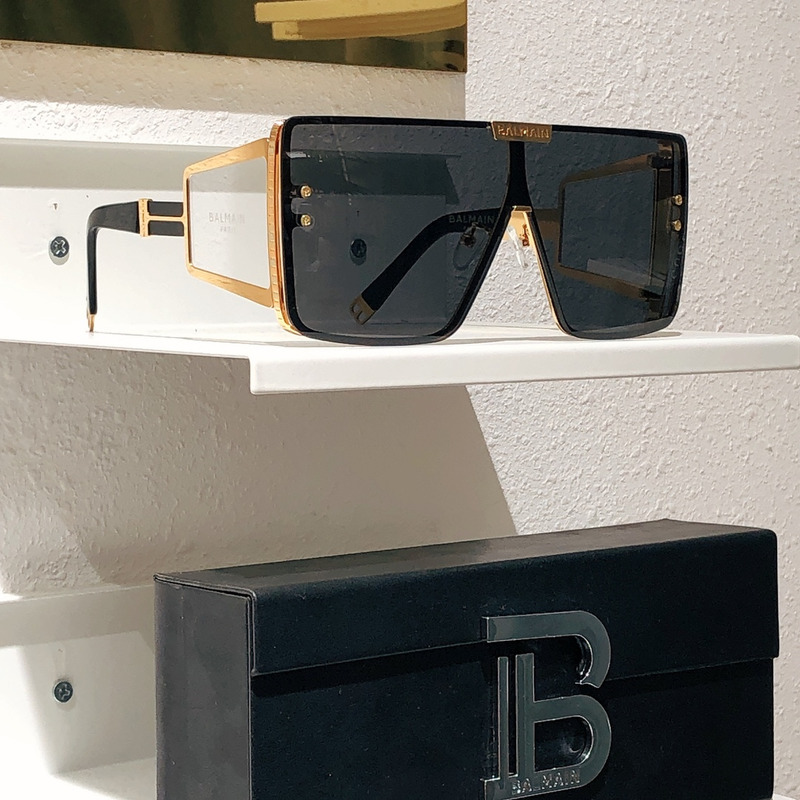 Balmain Gold And Black Sunglasses With Logo