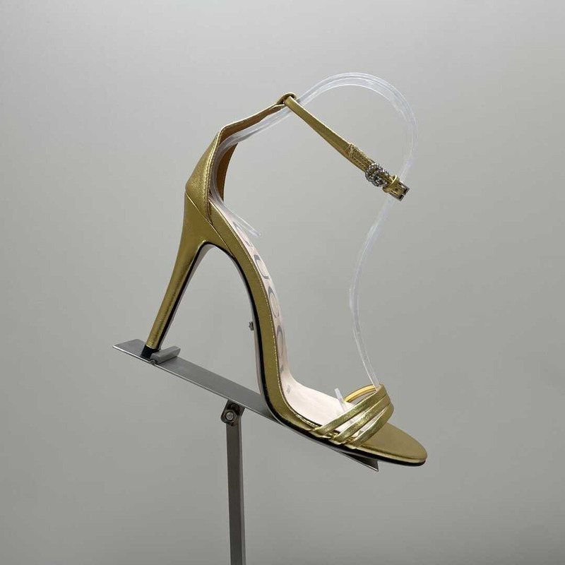 G*u*i stiletto heels  gold