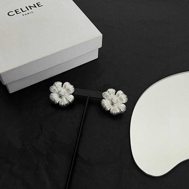 Ce**e flower earrings in silver