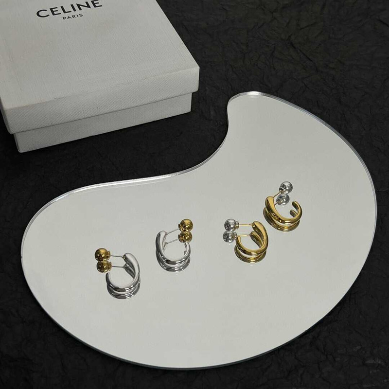 Ce**e earrings in brass silver