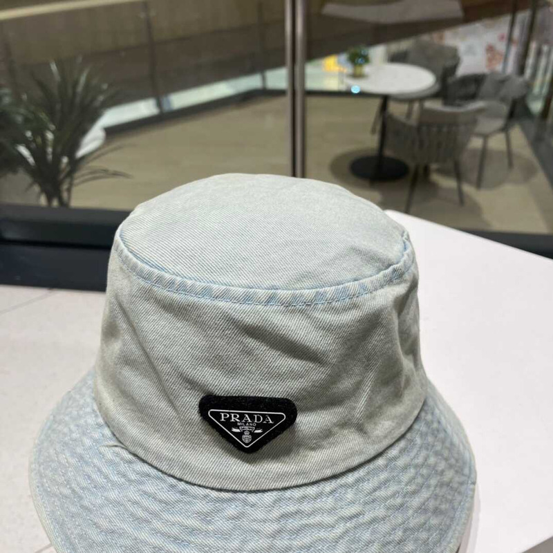 Pra*a denim bucket hat with logo washed blue