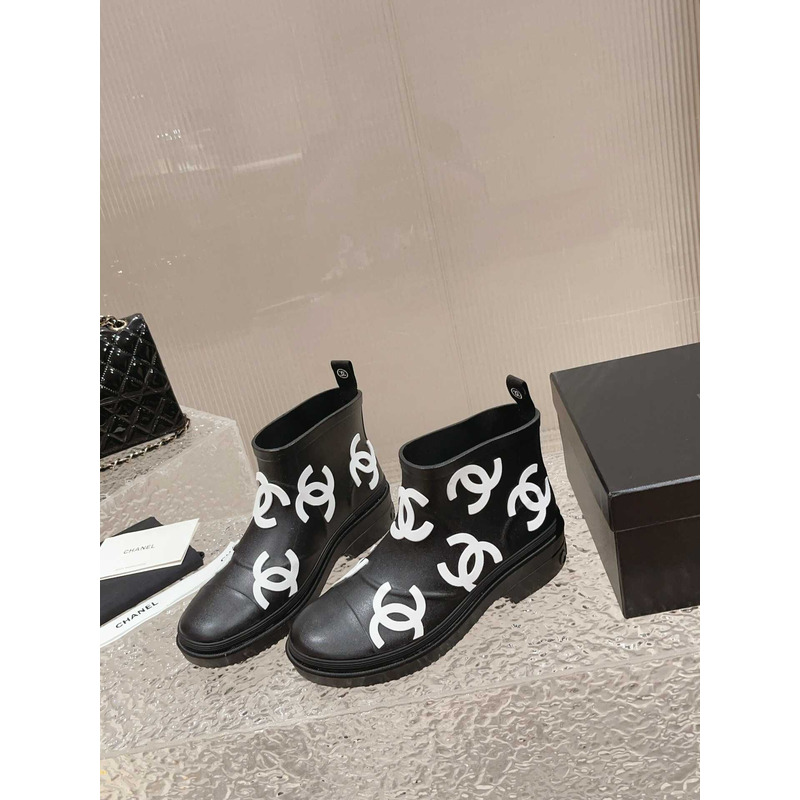 Ch*el short rain boots black and white