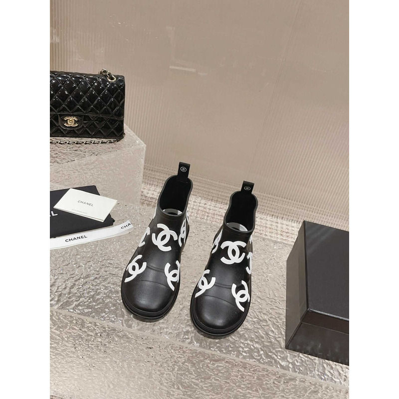 Ch*el short rain boots black and white