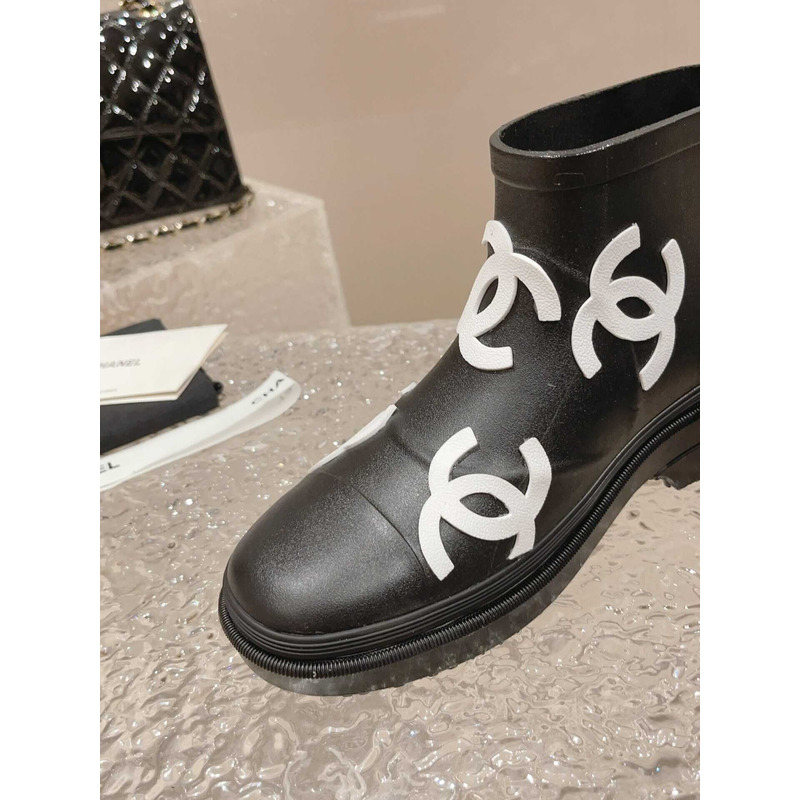 Ch*el short rain boots black and white