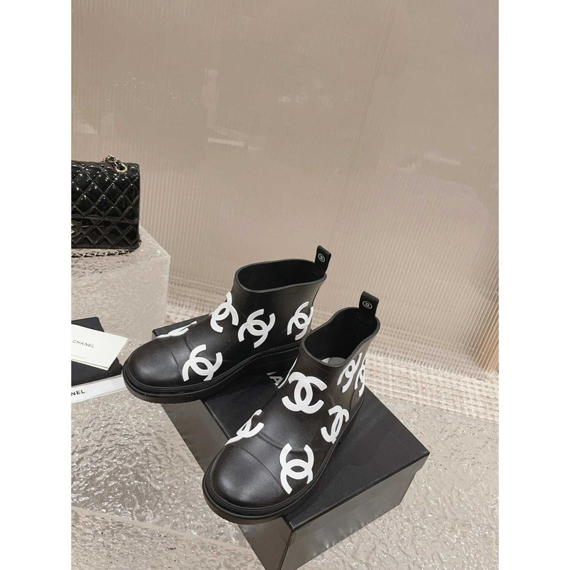 Ch*el short rain boots black and white