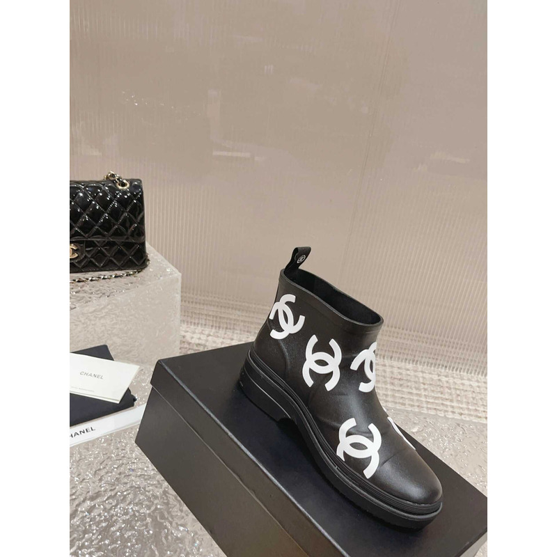 Ch*el short rain boots black and white