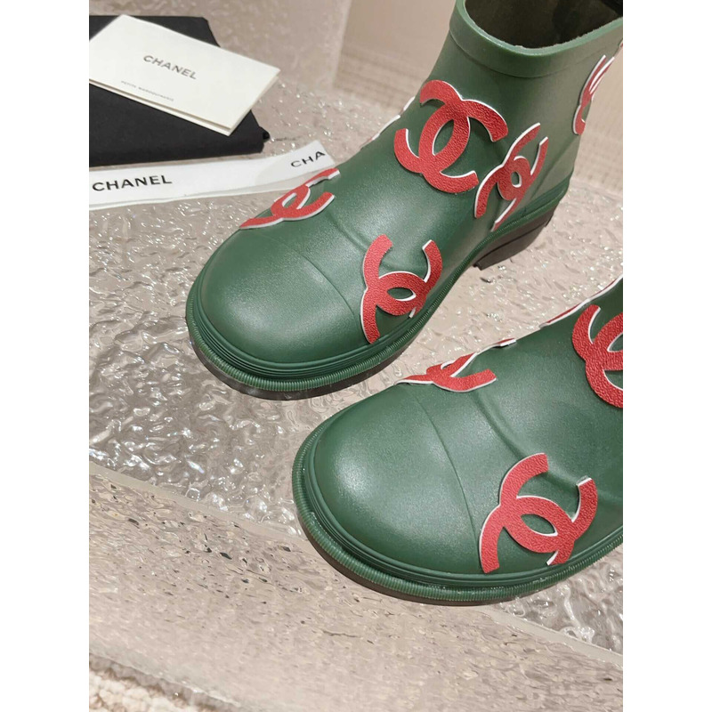 Ch*el short rain boots green and red logo