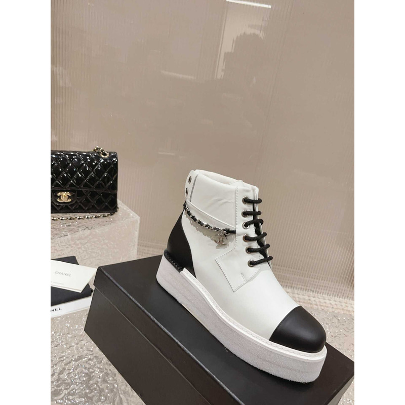 Ch*el white and black lambskin lace up biker boots