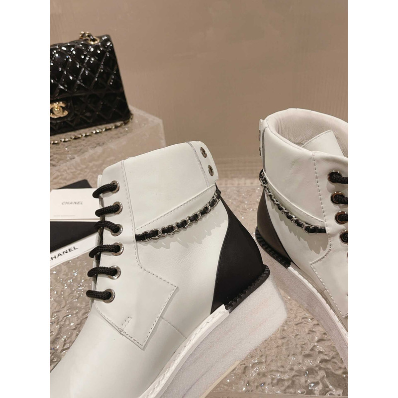 Ch*el white and black lambskin lace up biker boots