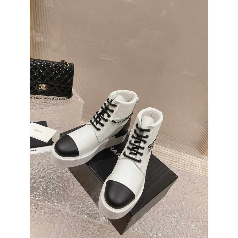 Ch*el white and black lambskin lace up biker boots