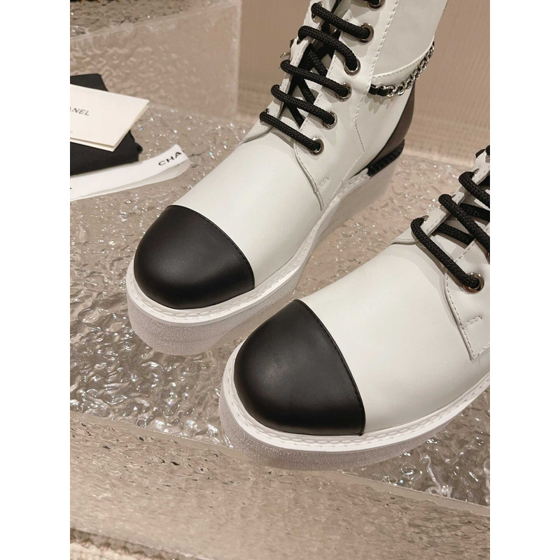 Ch*el white and black lambskin lace up biker boots