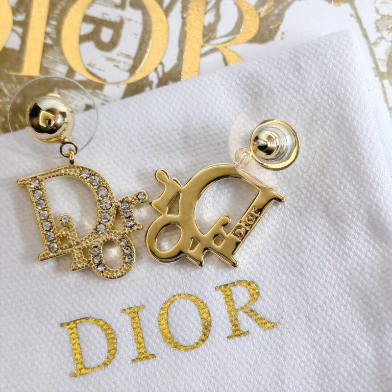 D*or gold letter stud earrings