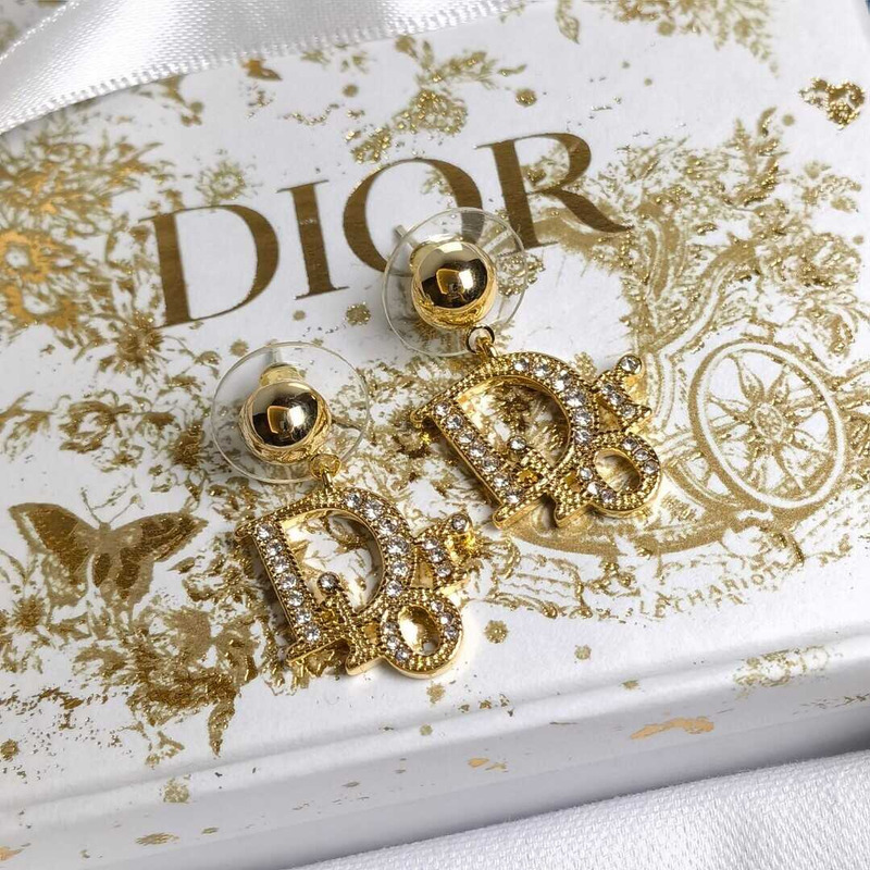 D*or gold letter stud earrings