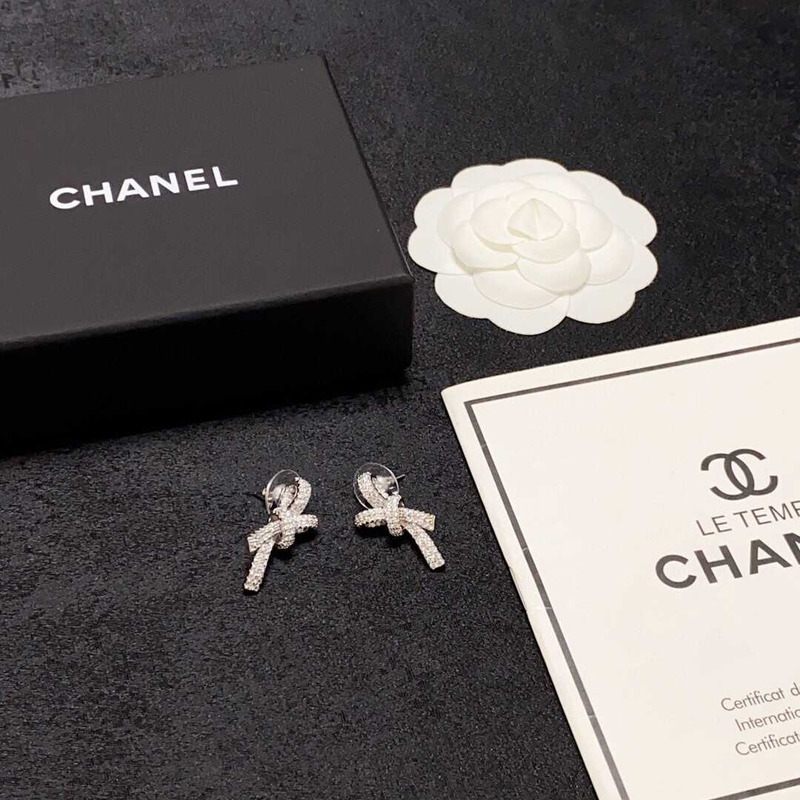 Ch*el bow tie sparkling diamond earrings