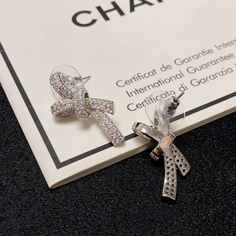 Ch*el bow tie sparkling diamond earrings