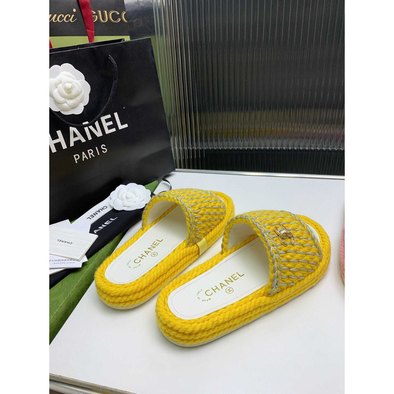 Ch*el braided knit metallic cc slides yellow