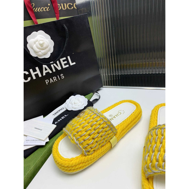 Ch*el braided knit metallic cc slides yellow