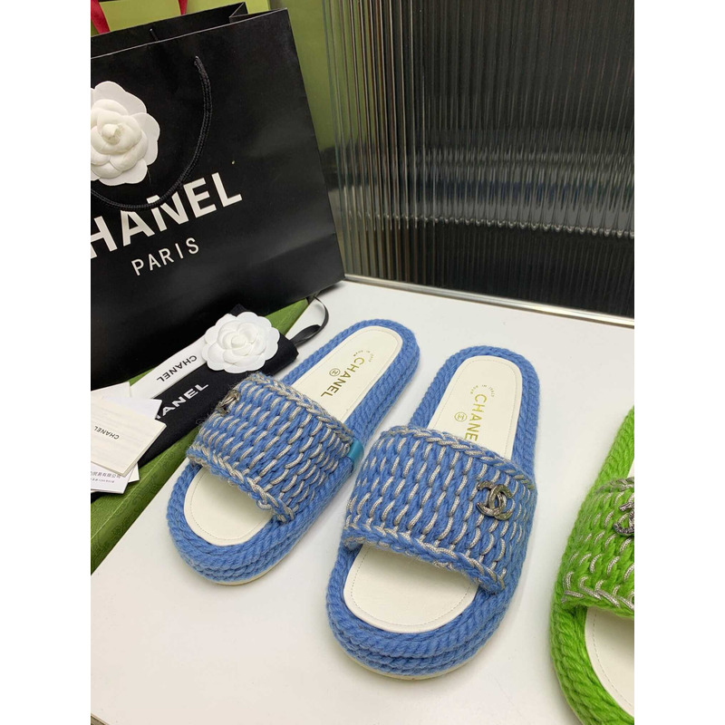 Ch*el braided knit metallic cc slides light blue