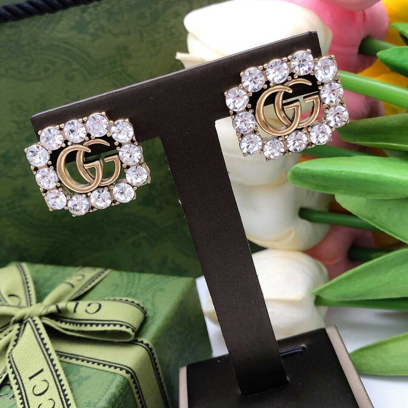 G*u*i crystal earrings gold