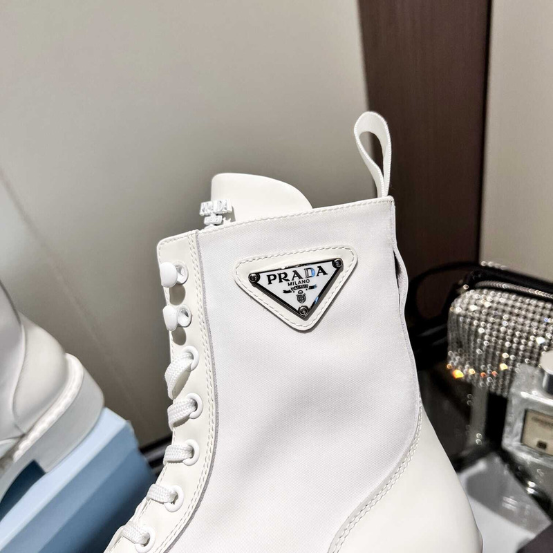 Pra*a brushed leather ankle boots white