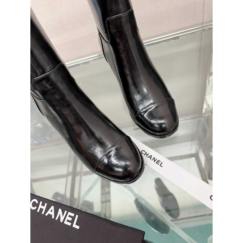 Ch*el cap-toe leather boots black