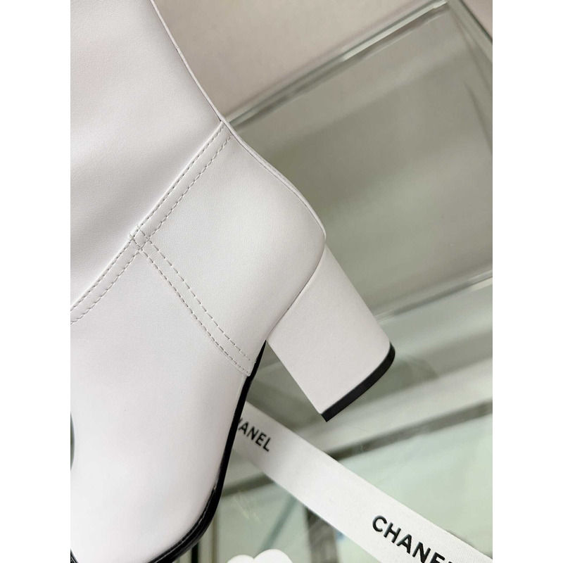 Ch*el cap-toe leather boots white