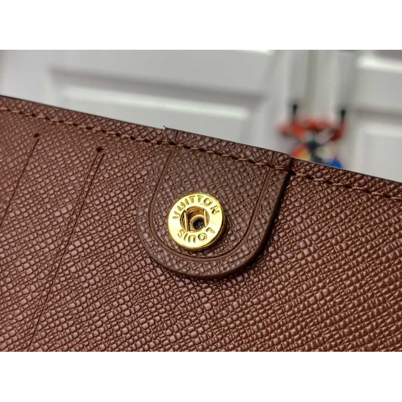 l**is V*t*n zippy wallet monogram brown