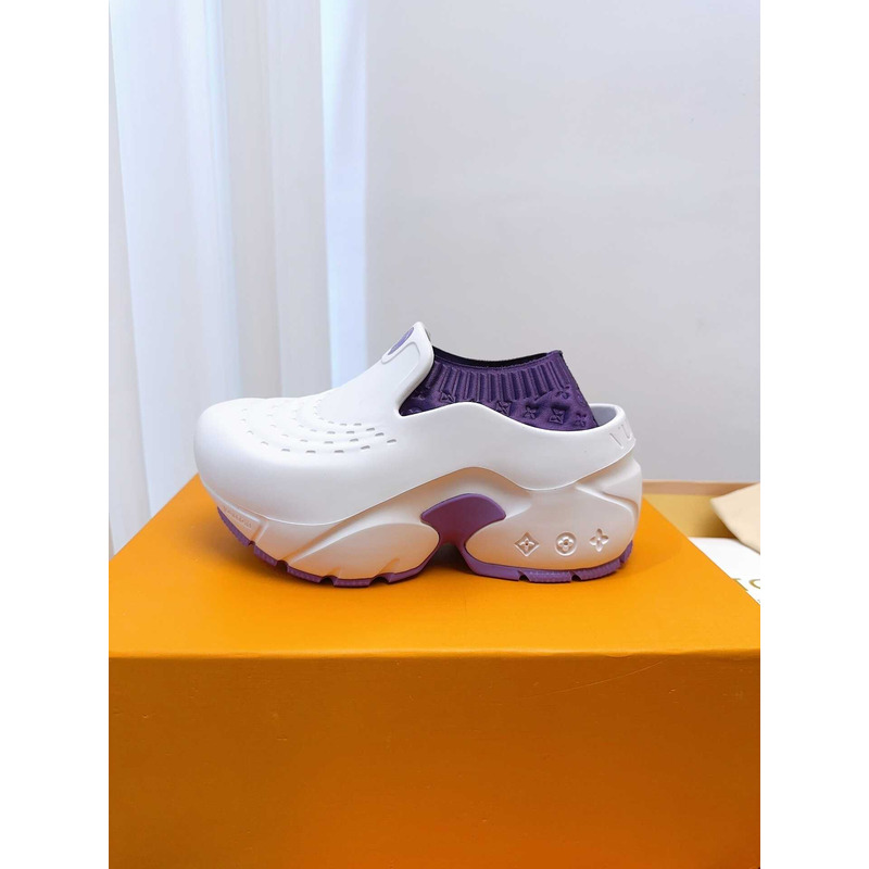 l**is V*t*n foam clogs purple and white