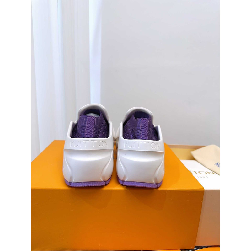 l**is V*t*n foam clogs purple and white