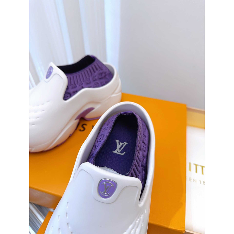 l**is V*t*n foam clogs purple and white