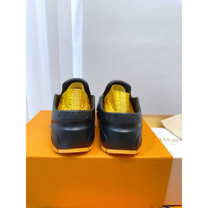 l**is V*t*n foam clogs yellow and black