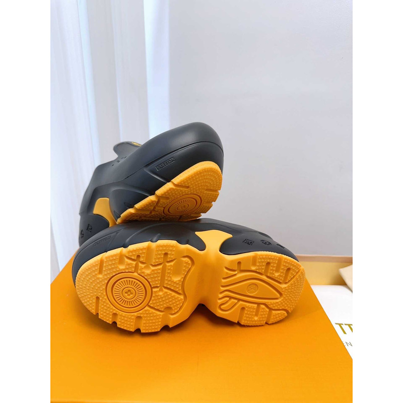 l**is V*t*n foam clogs yellow and black