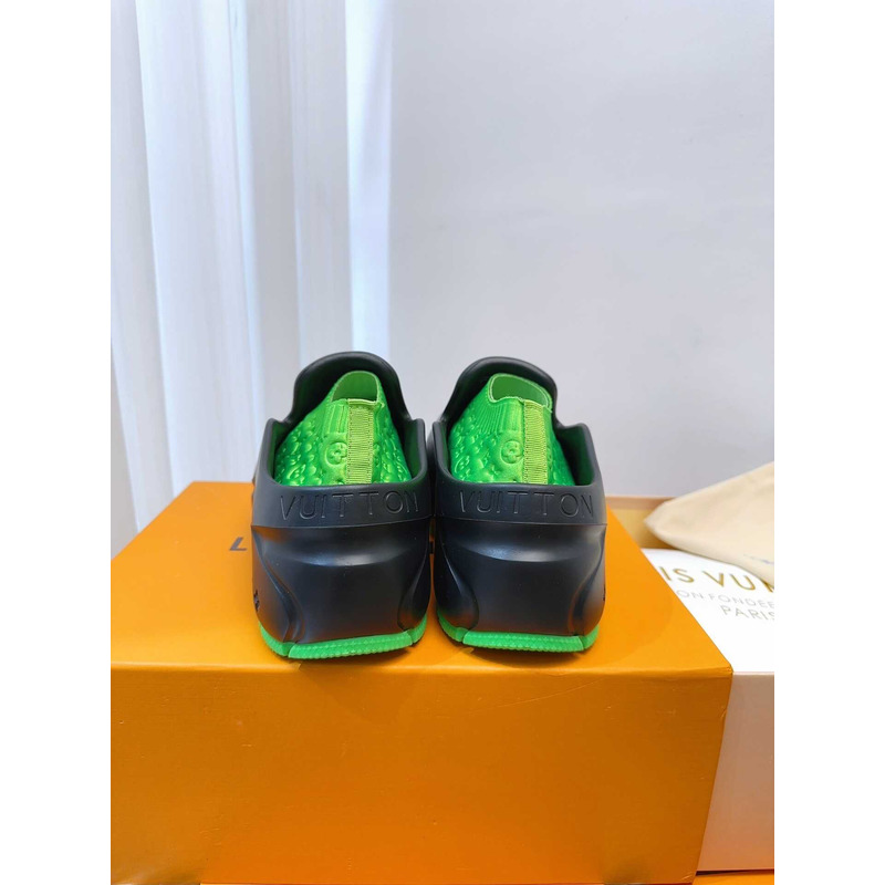 l**is V*t*n foam clogs green and black