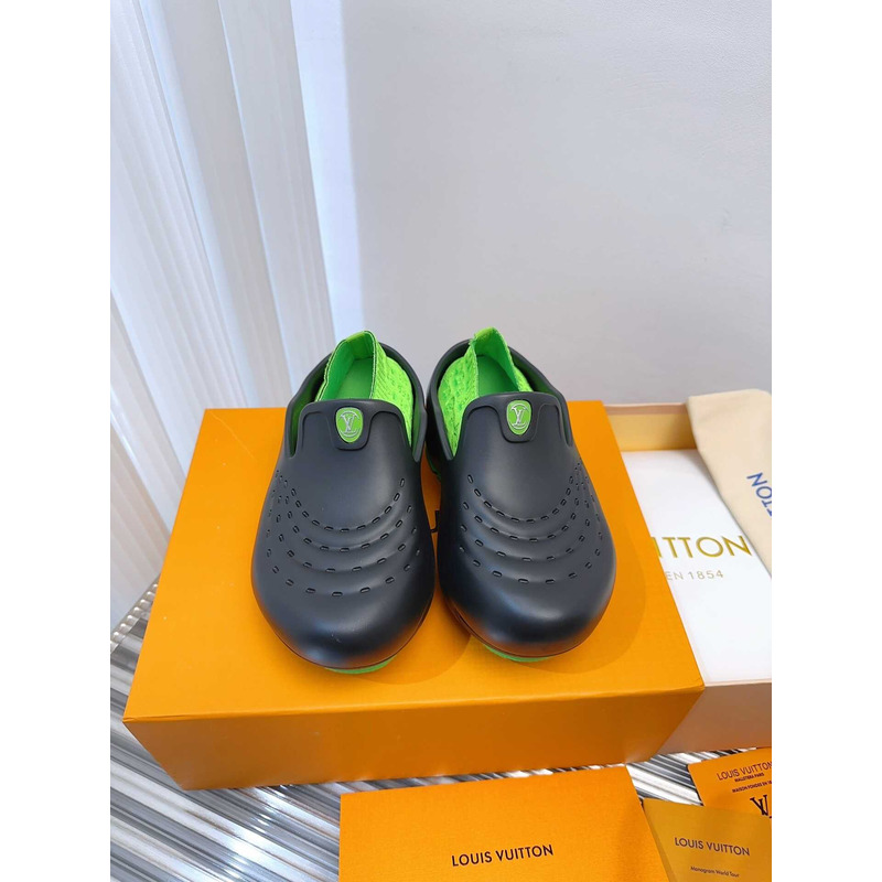 l**is V*t*n foam clogs green and black