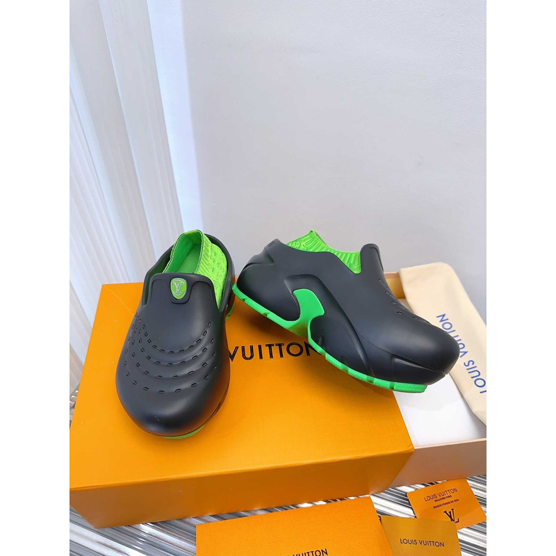 l**is V*t*n foam clogs green and black