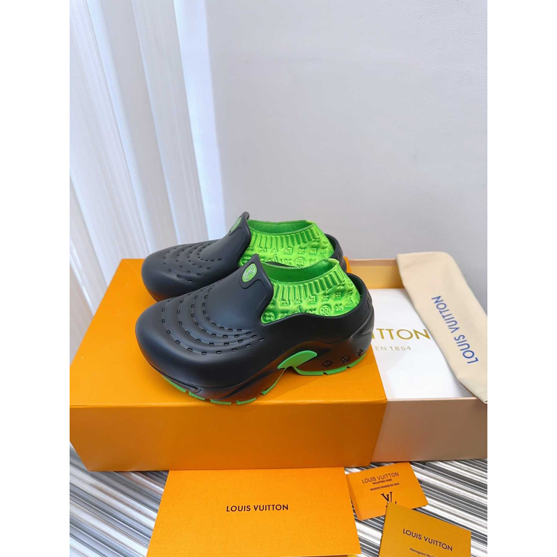 l**is V*t*n foam clogs green and black