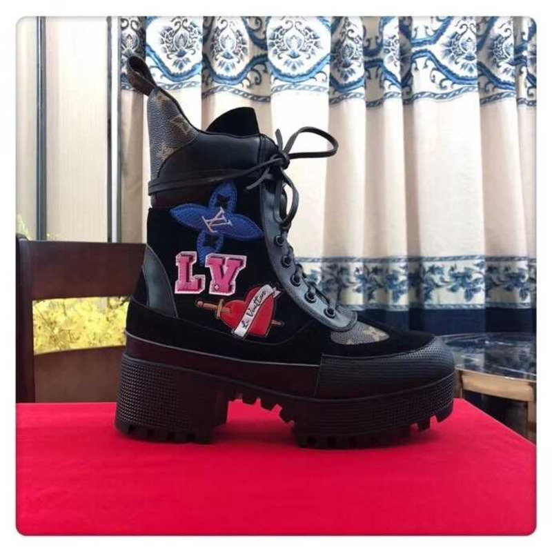 l**is V*t*n laureate platform desert boots with cartoon logo