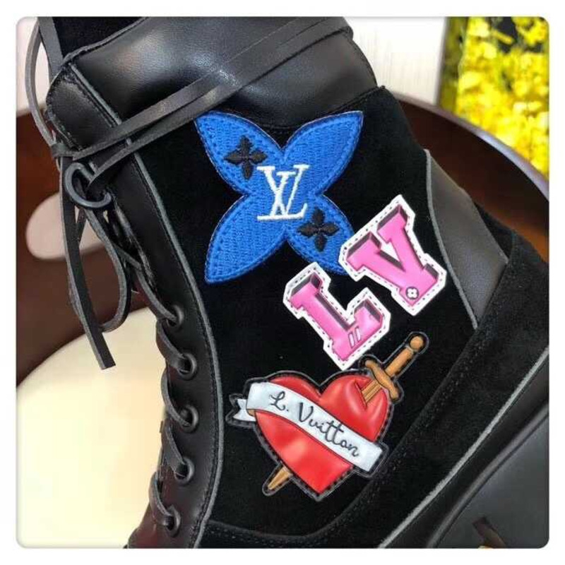 l**is V*t*n laureate platform desert boots with cartoon logo