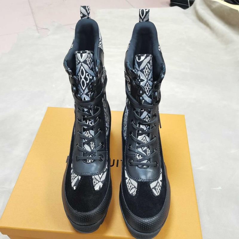 l**is V*t*n monogram canvas combat boots