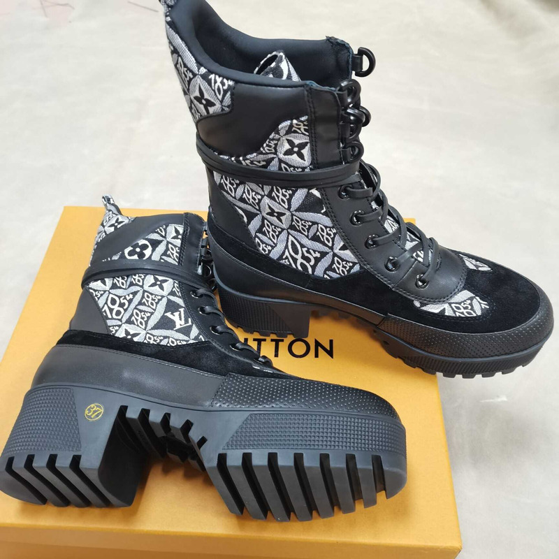 l**is V*t*n monogram canvas combat boots