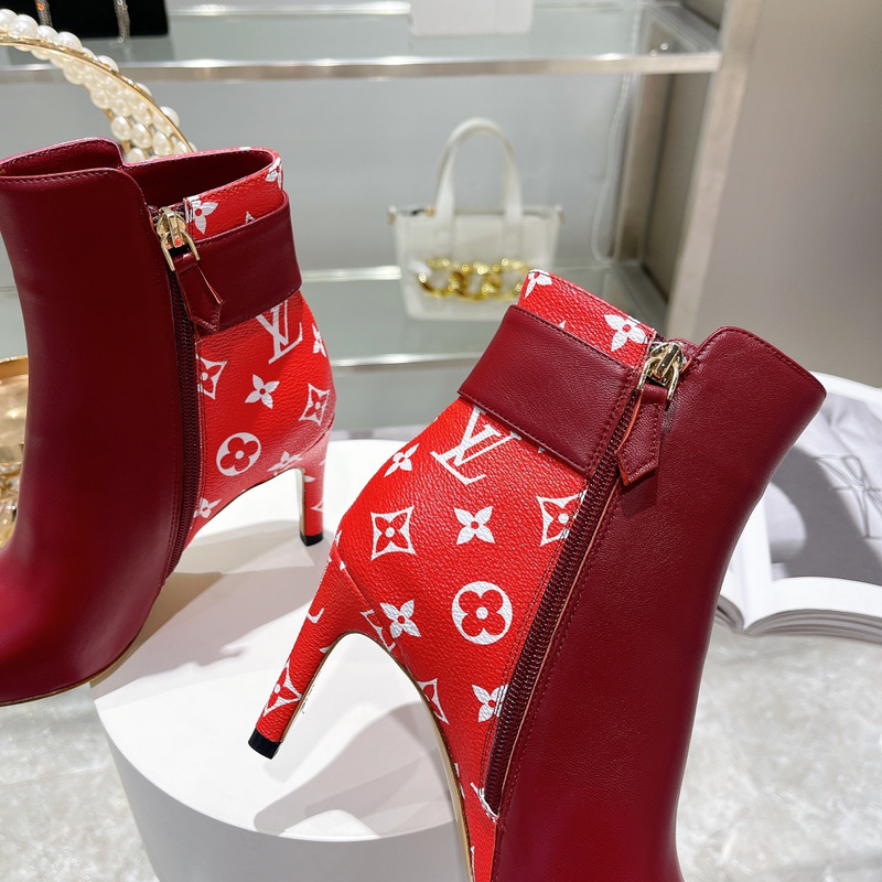 l**is V*t*n ankle heels with logo red